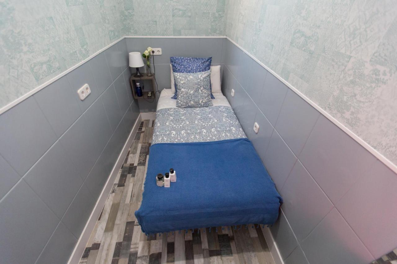 Quarto Individual Económico com Casa de Banho Partilhada