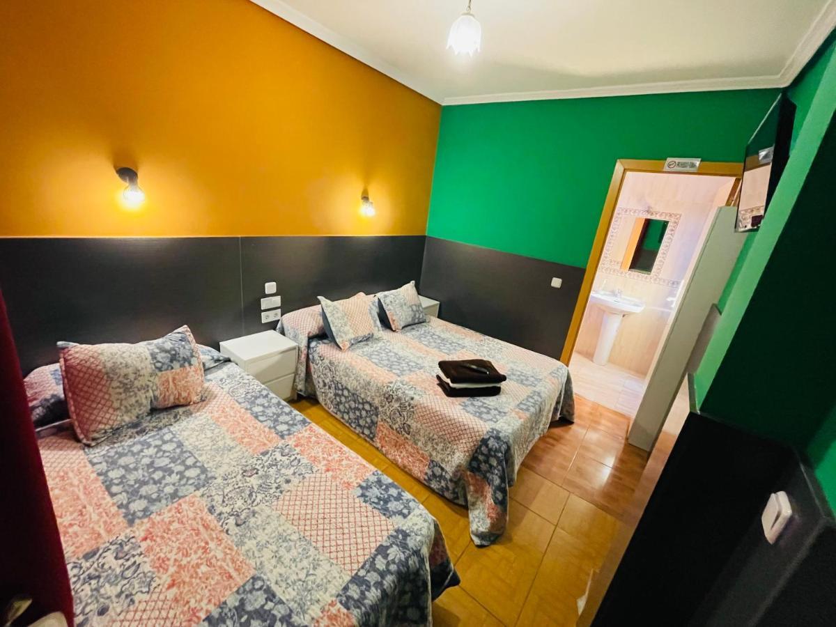 Quarto Triplo com Casa de Banho Privativa