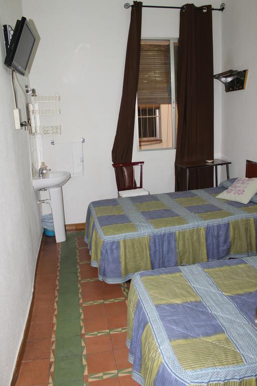 Quarto Duplo com Casa de Banho Partilhada