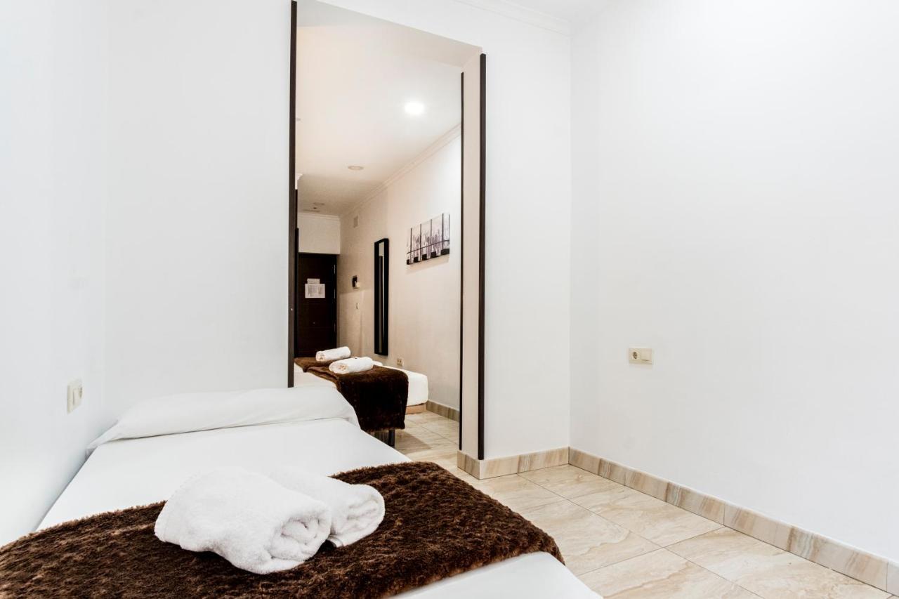 Quarto Triplo com Vista Cidade