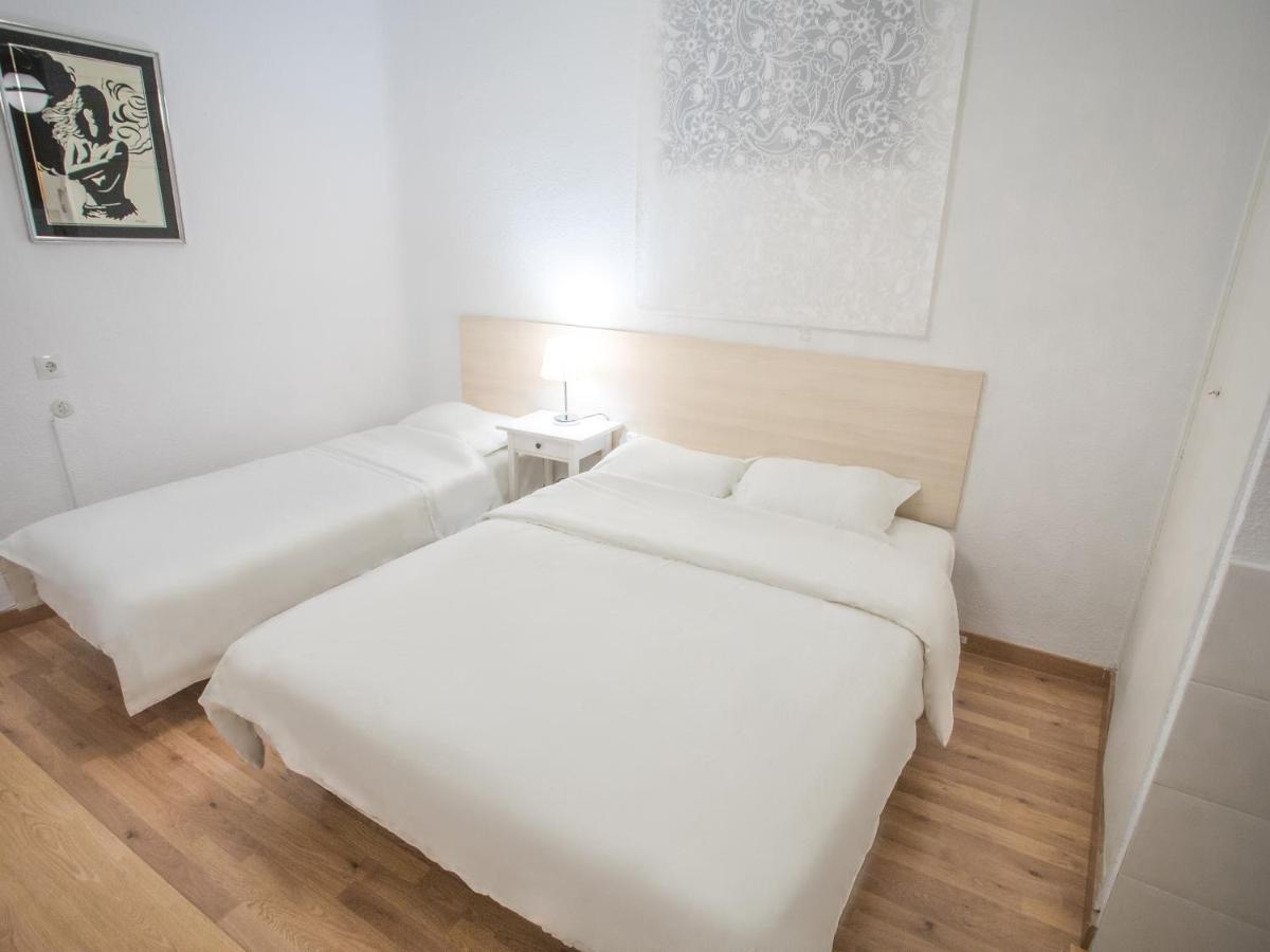 Quarto Triplo com Casa de Banho Partilhada