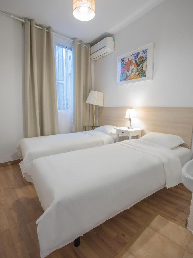 Quarto Twin com Casa de Banho Partilhada