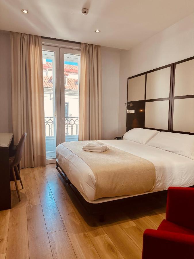 Quarto Duplo com Varanda e Vista Cidade