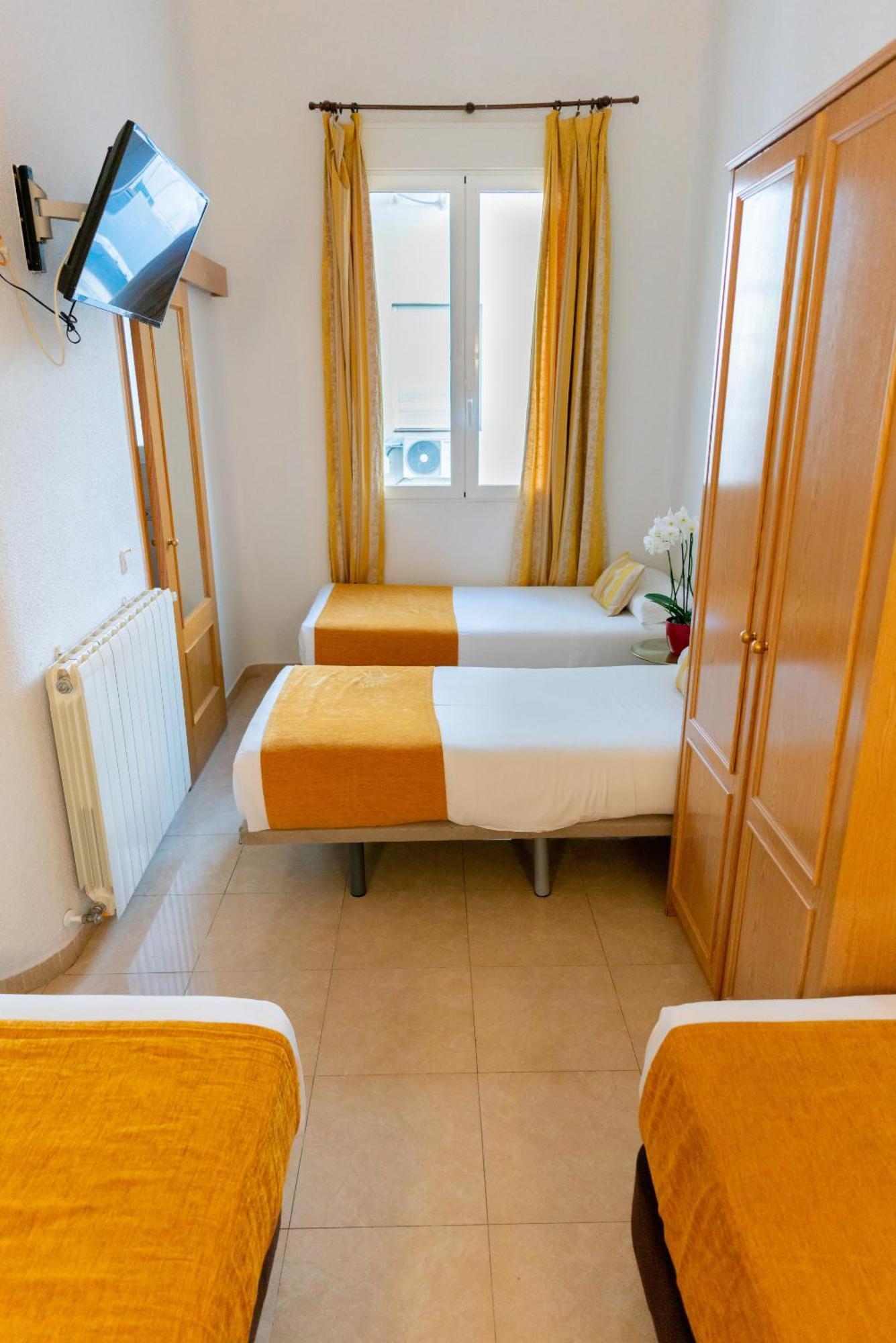 Quarto Quádruplo com Casa de Banho Privativa