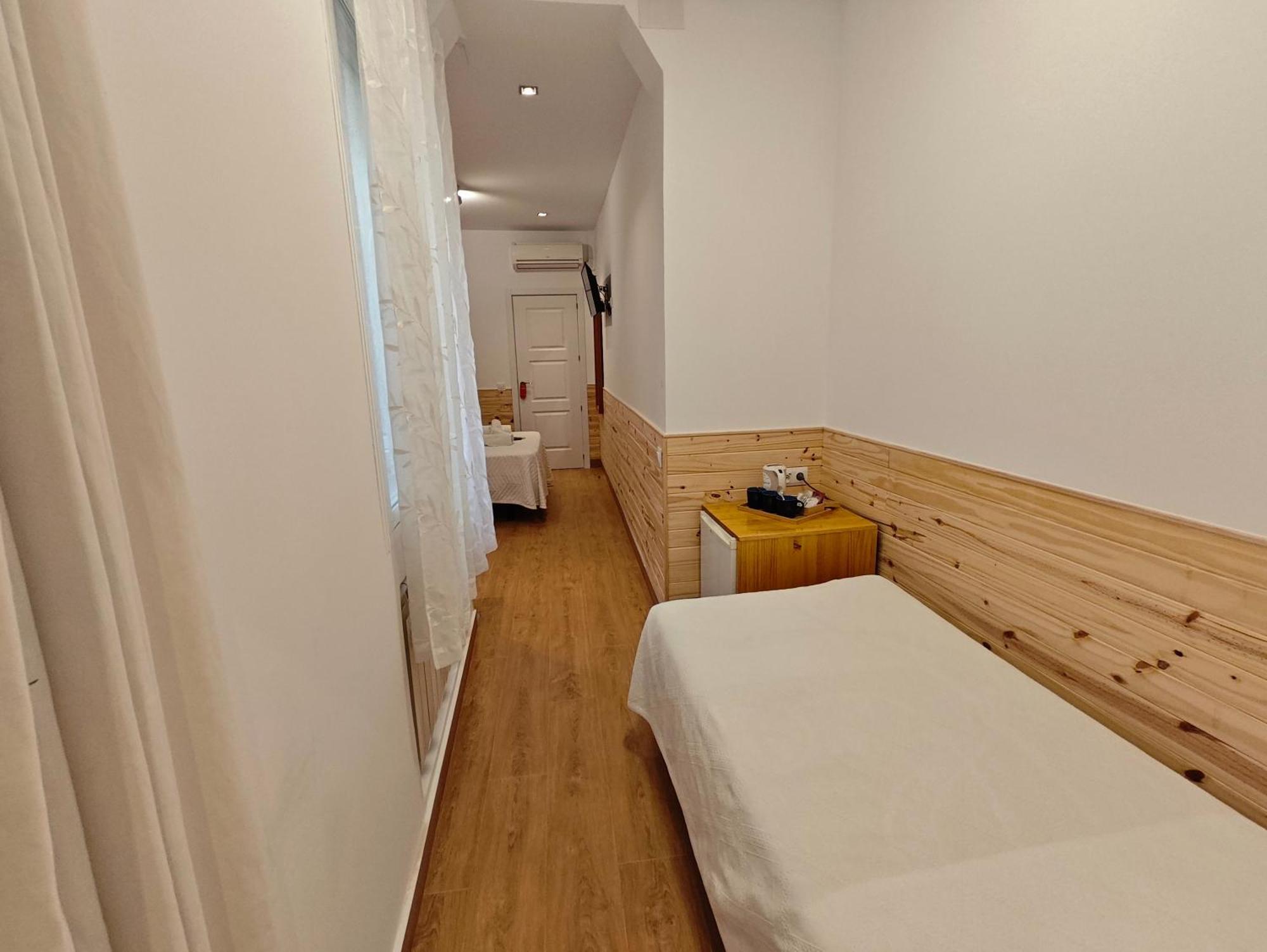 Quarto Triplo com Casa de Banho Privativa