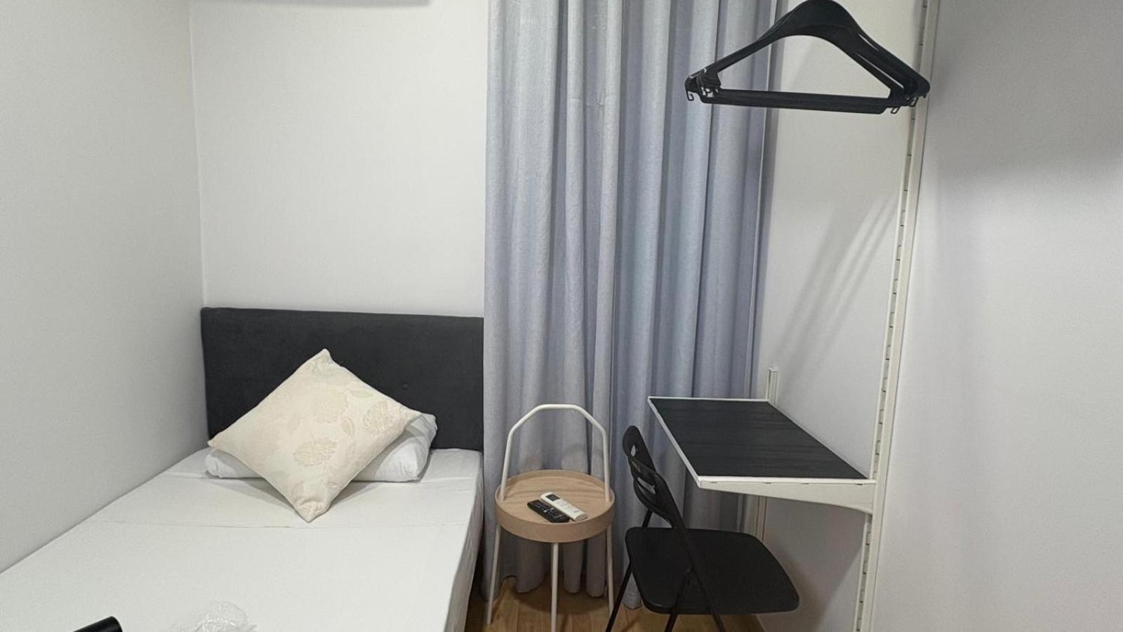 Quarto Individual com Casa de Banho Partilhada