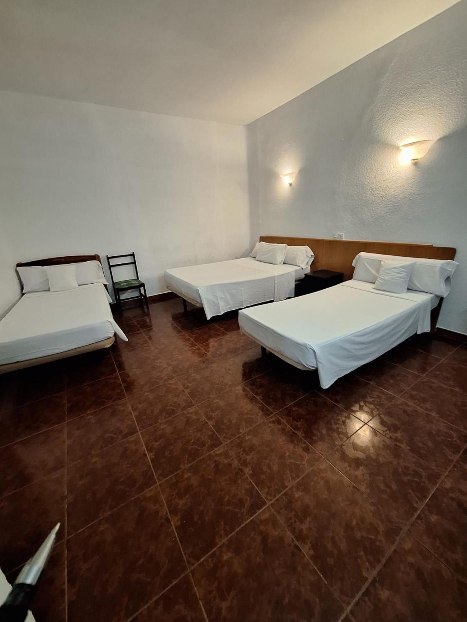 Quarto Quádruplo com Casa de Banho Partilhada