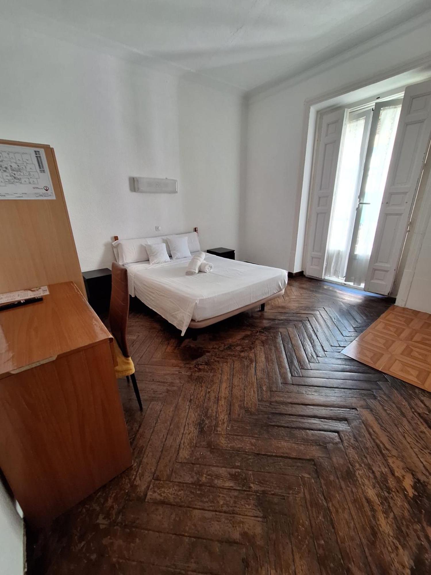 Quarto Duplo com Casa de Banho Partilhada