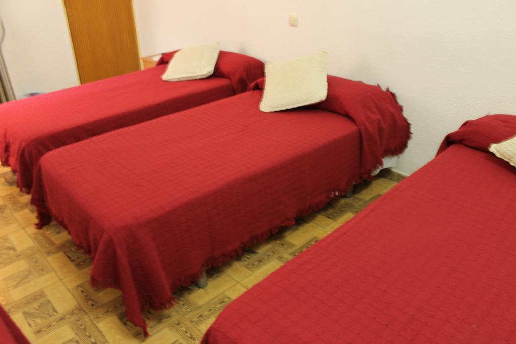 Quarto Triplo com Casa de Banho Partilhada