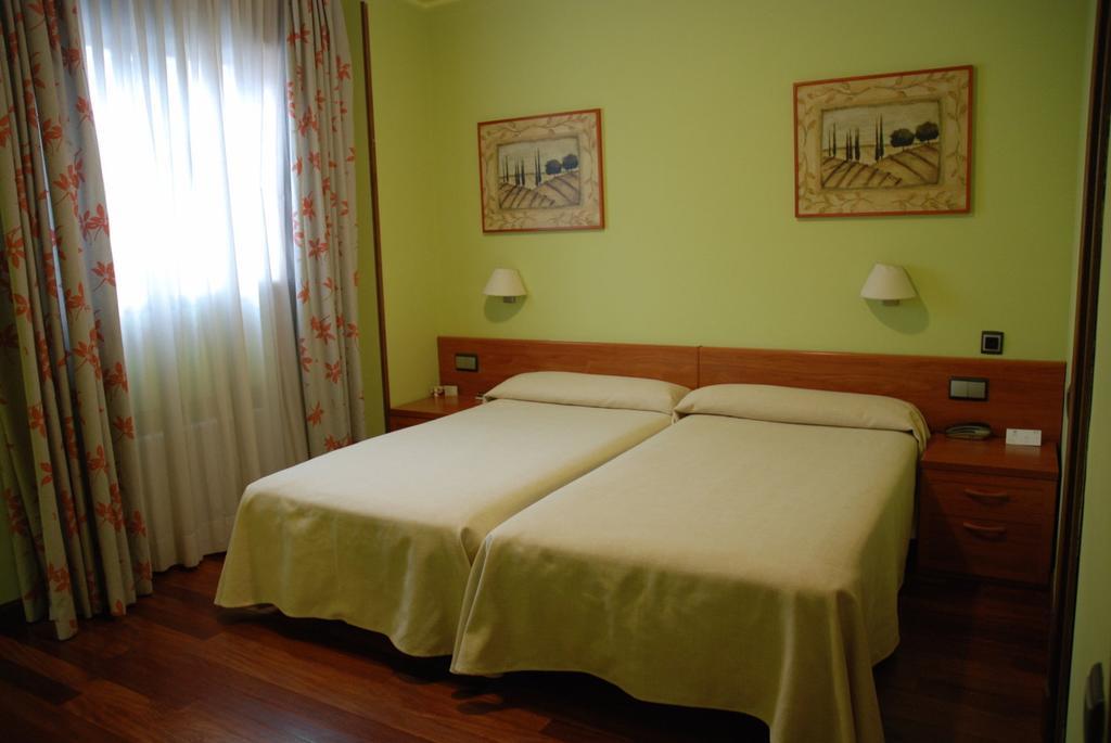 Quarto Duplo com Cama Extra (3 Adultos)