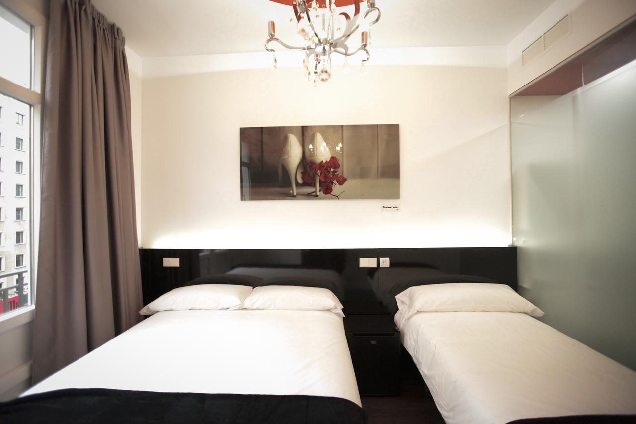 Quarto Duplo com Cama Extra (2 Adultos + 1 Criança)